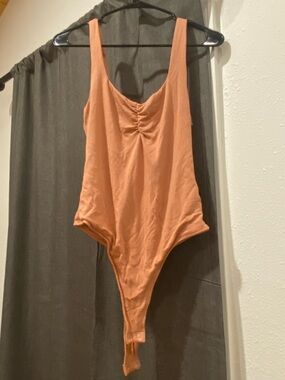 Peach Body Suit